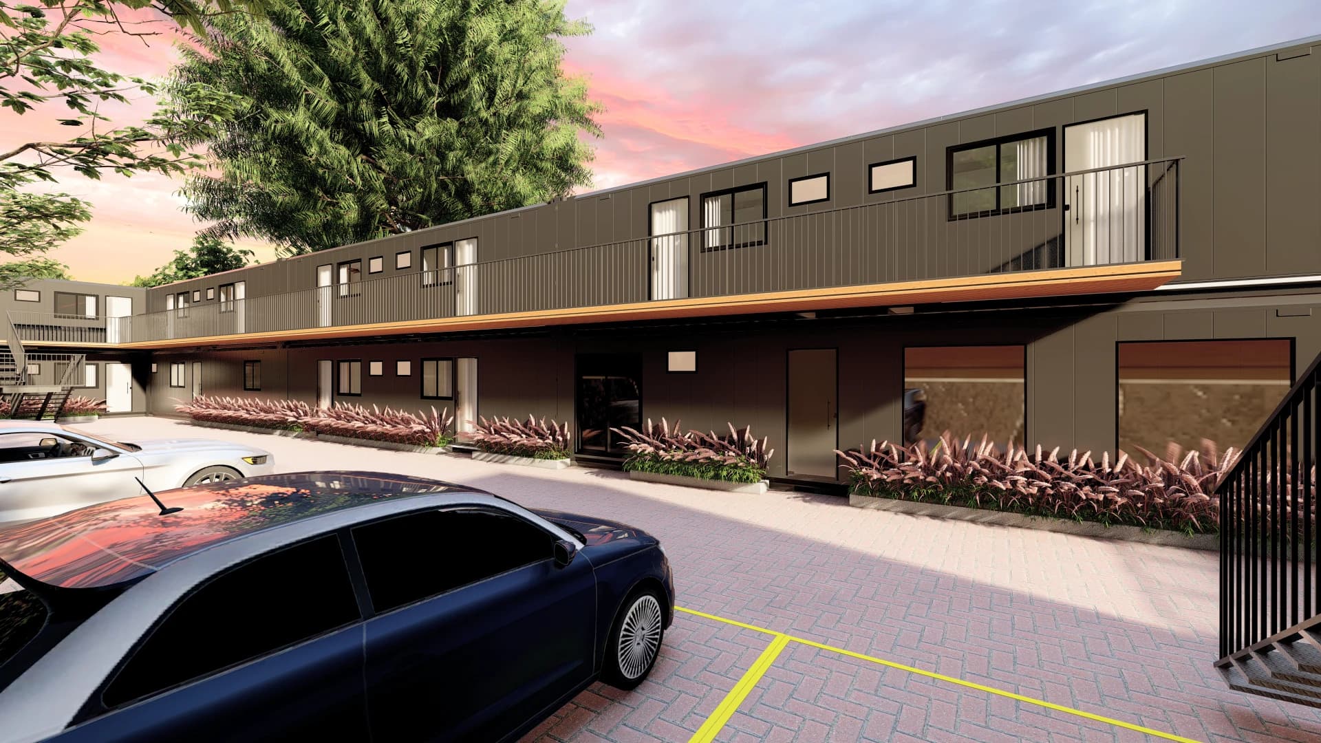 Render da fachada interna da Norte Loft: dois pavimentos, passarela superior e paisagismo junto às unidades